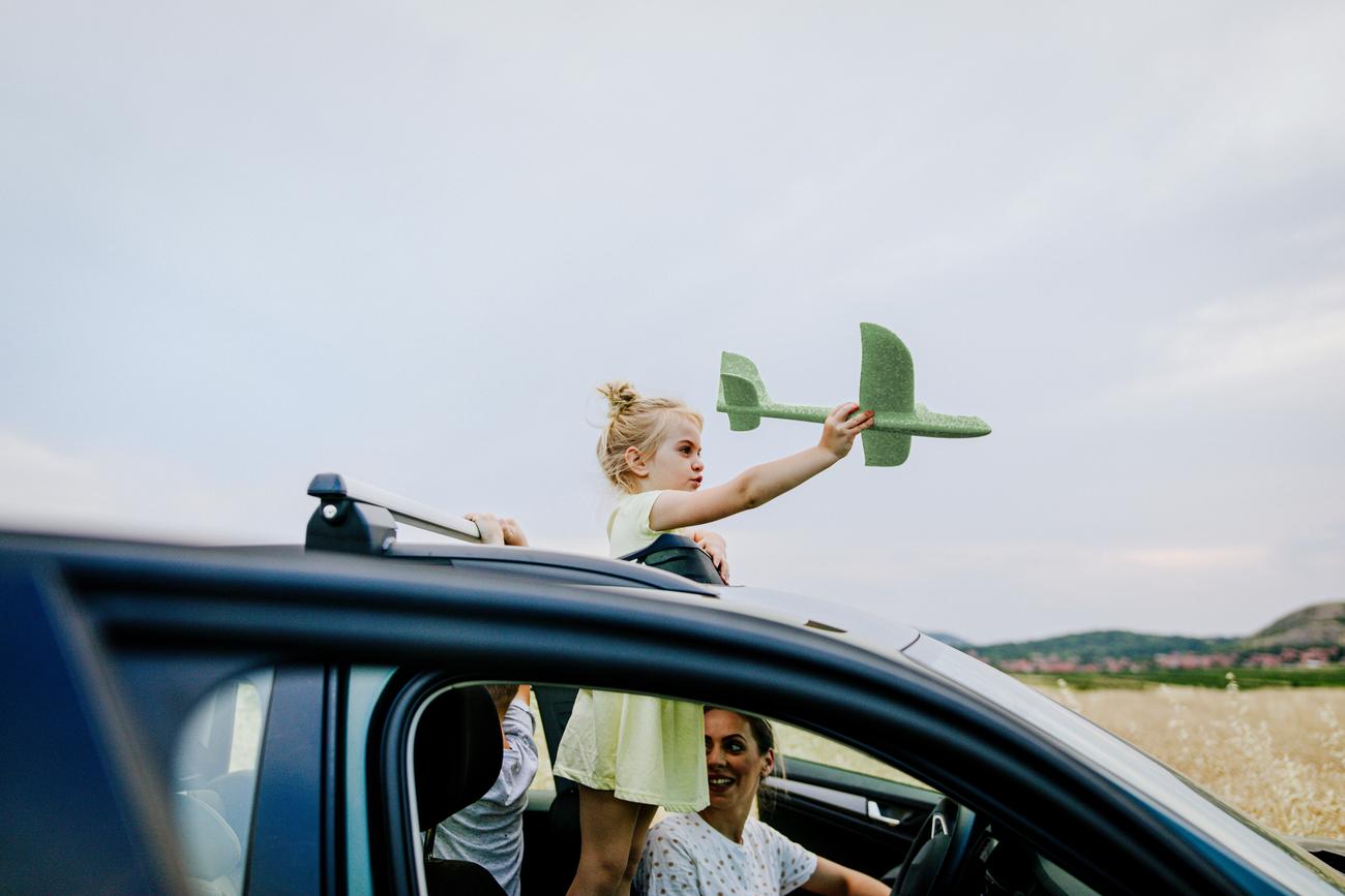 kids playing with plane toy